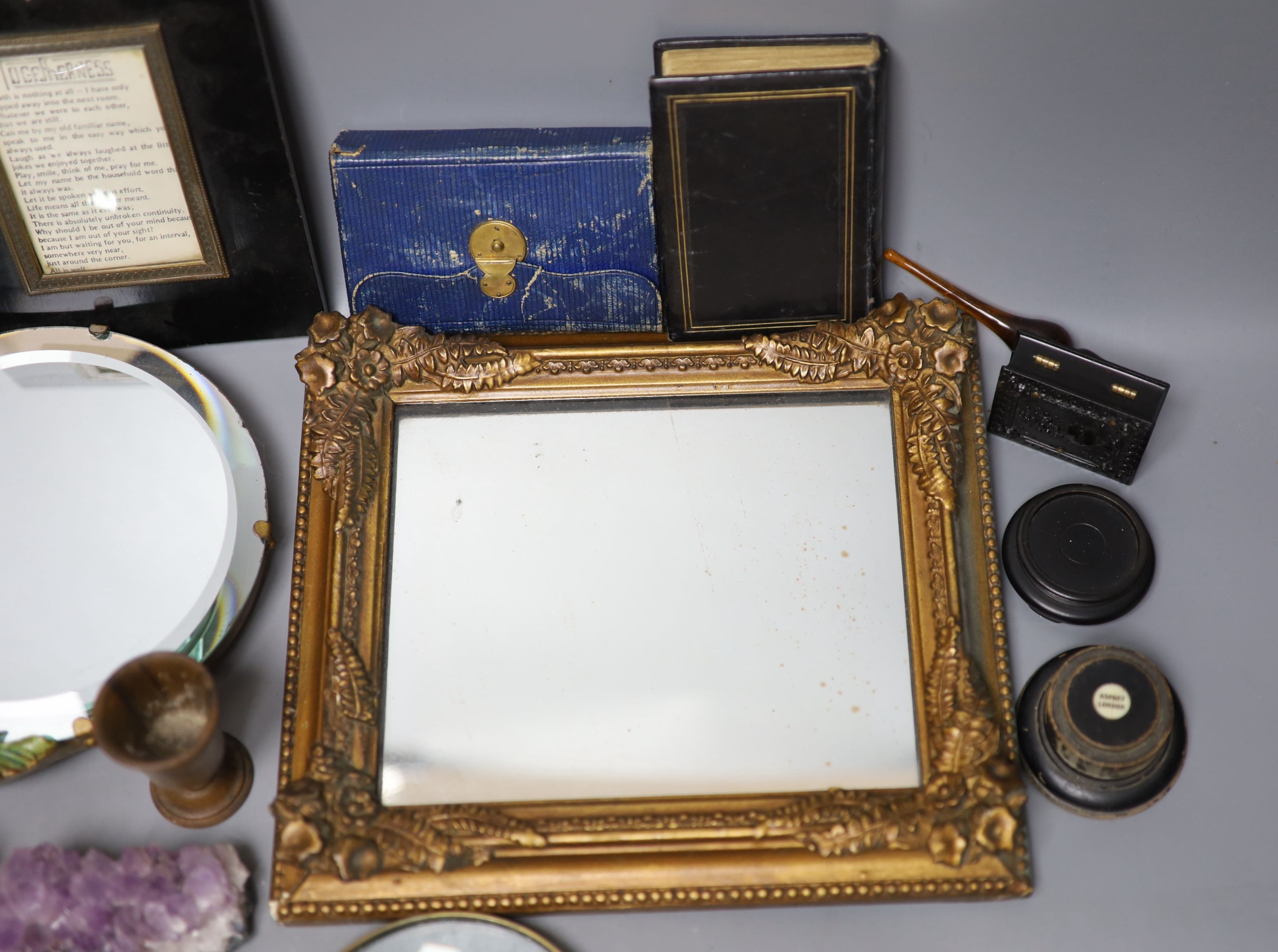 A group of objects of vertu, various frames, magnifying glasses etc.